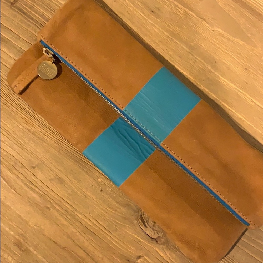 Clare foldover leather clutch with blue stripe